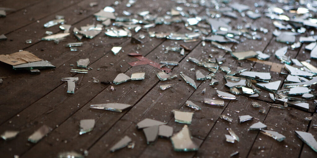 shattered glass on floor